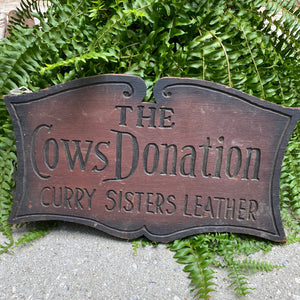 Curry Sisters Leather sign