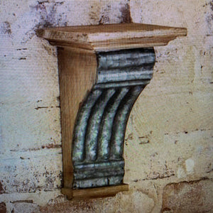 Embossed wall sconce